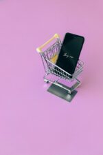 Silver Shopping Cart With Blue Background